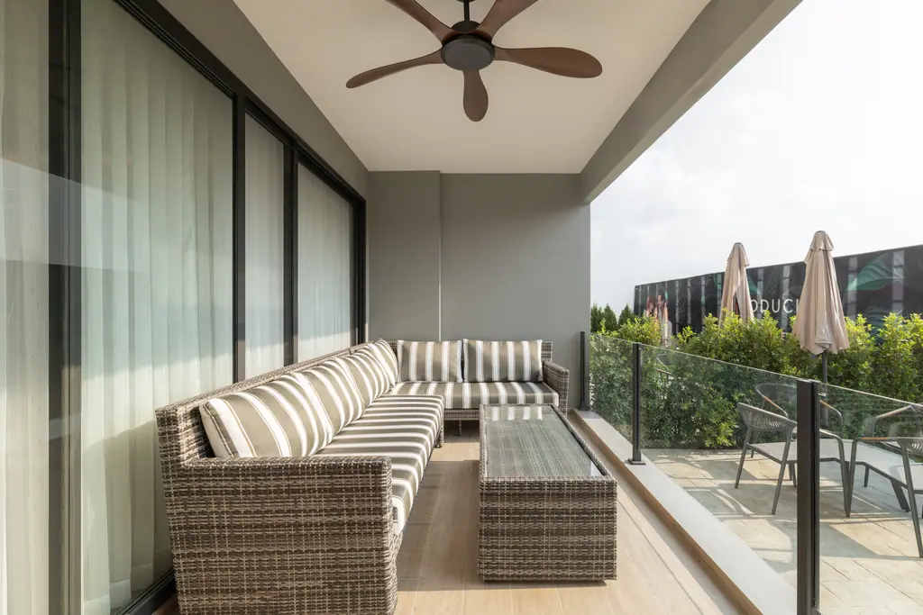 Balcony seating in the three bedroom show unit